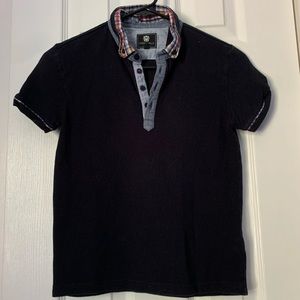 Boys Black short sleeve polo shirt.